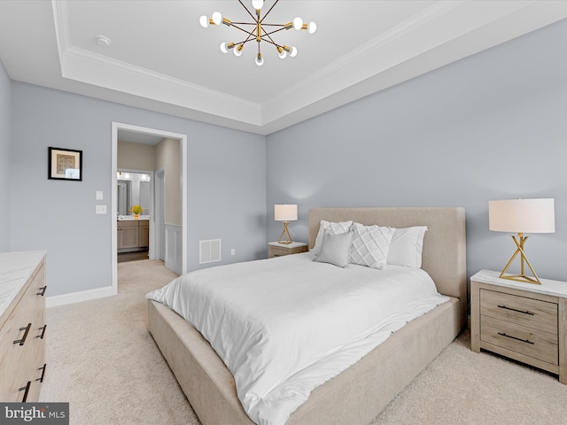 carpeted bedroom featuring an inviting chandelier, a raised ceiling, connected bathroom, and ornamental molding