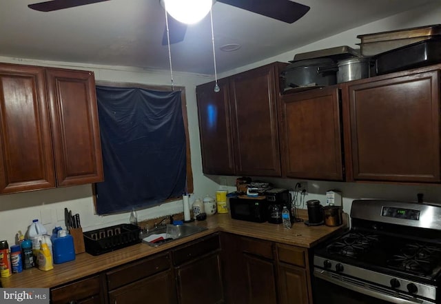 kitchen featuring sink, ceiling fan, and stainless steel range with gas cooktop