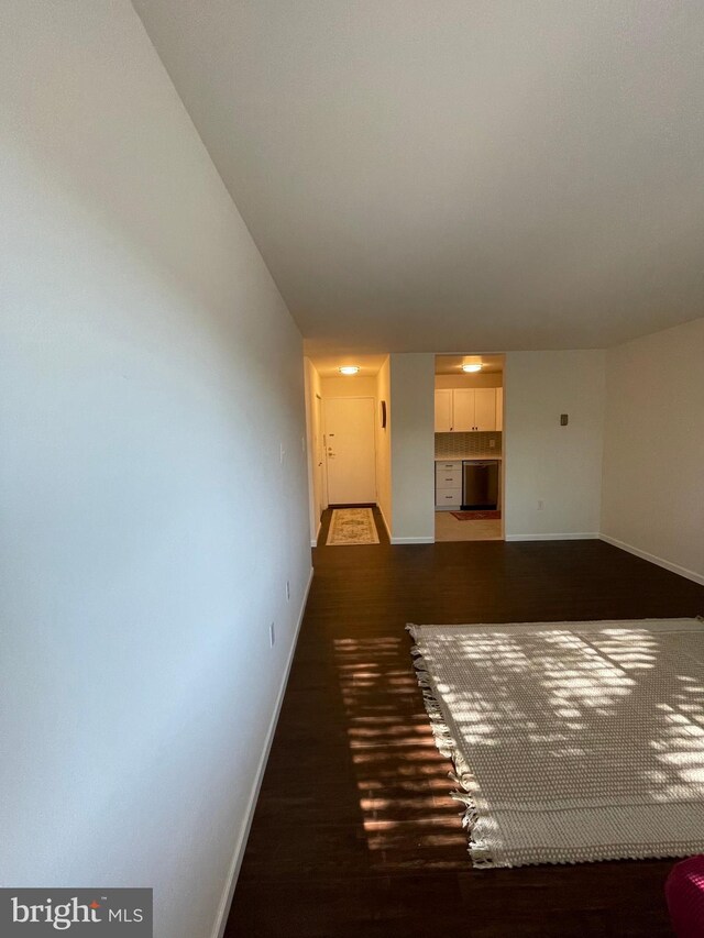 interior space with dark wood-type flooring