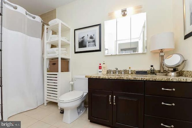 full bath with vanity, tile patterned floors, curtained shower, and toilet