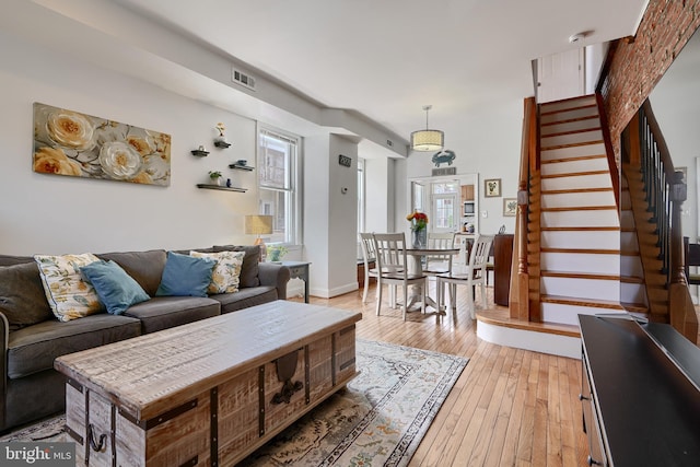 living room featuring light wood-type flooring