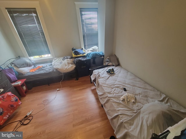 bedroom featuring light wood finished floors