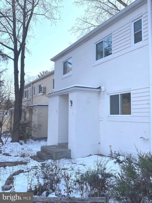 view of front of home with brick siding