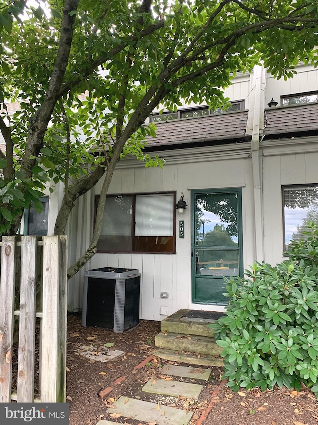 property entrance featuring central air condition unit