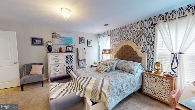 bedroom with carpet and visible vents