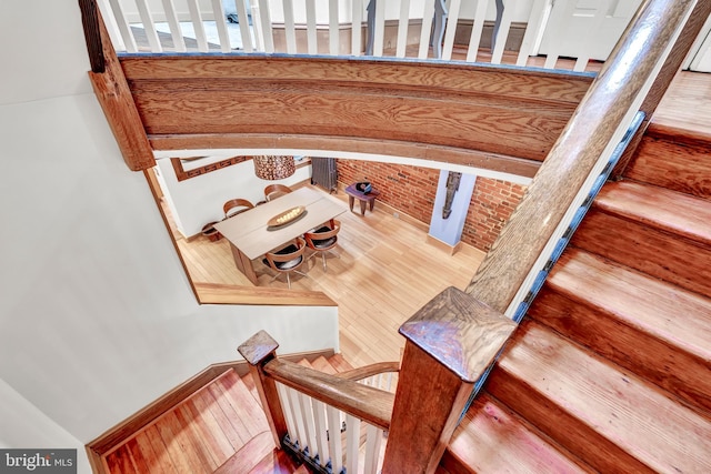 staircase featuring hardwood / wood-style flooring