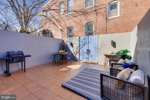 view of patio featuring a grill