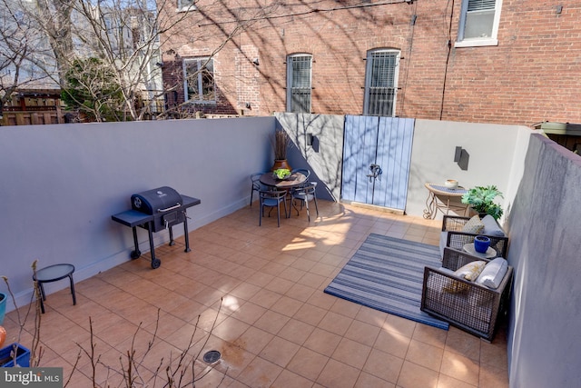 view of patio / terrace featuring a grill