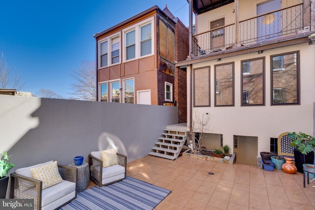 view of patio / terrace with a balcony