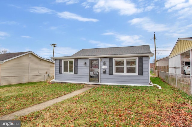 view of front of property with a front lawn