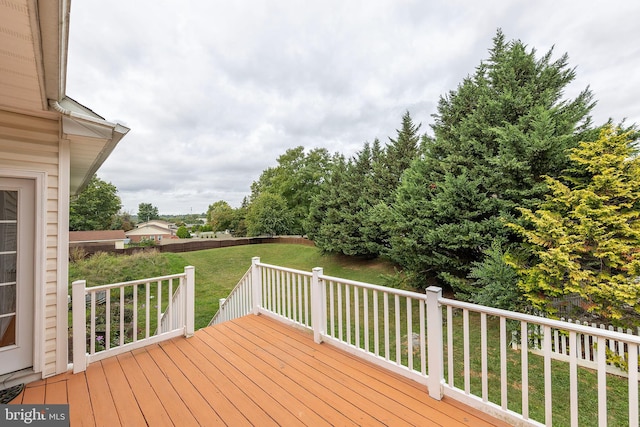 deck featuring a yard