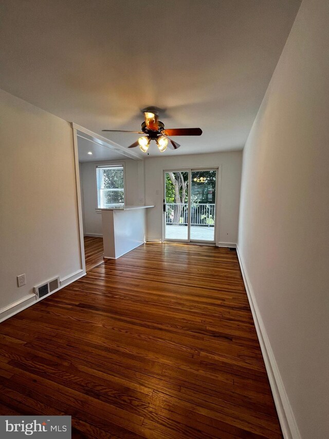 spare room featuring ceiling fan and wood-type flooring