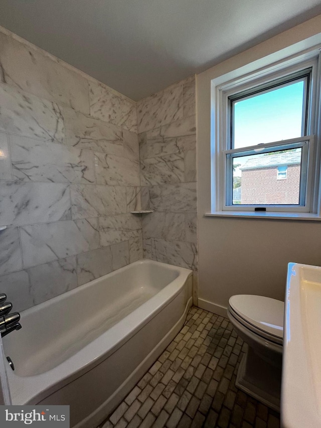 bathroom with tile patterned flooring, toilet, and vanity