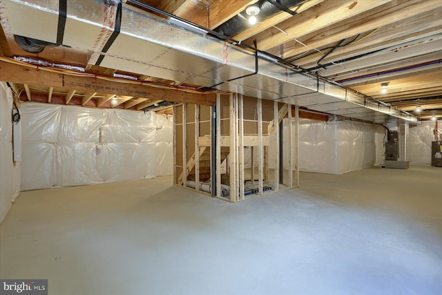 basement featuring water heater