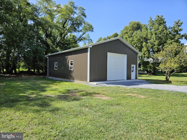 garage with a yard