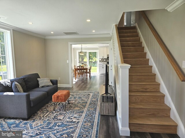 kitchen with open shelves, appliances with stainless steel finishes, white cabinets, a kitchen island, and beverage cooler