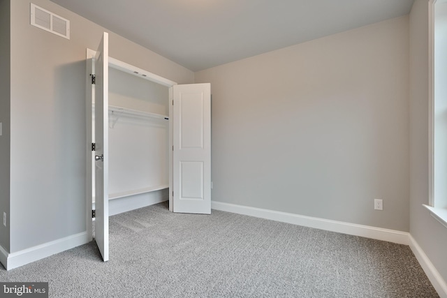 unfurnished bedroom with carpet flooring