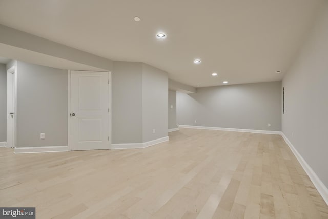 basement with light wood-type flooring