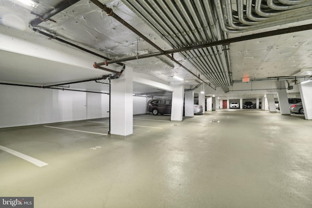 parking deck featuring a garage door opener