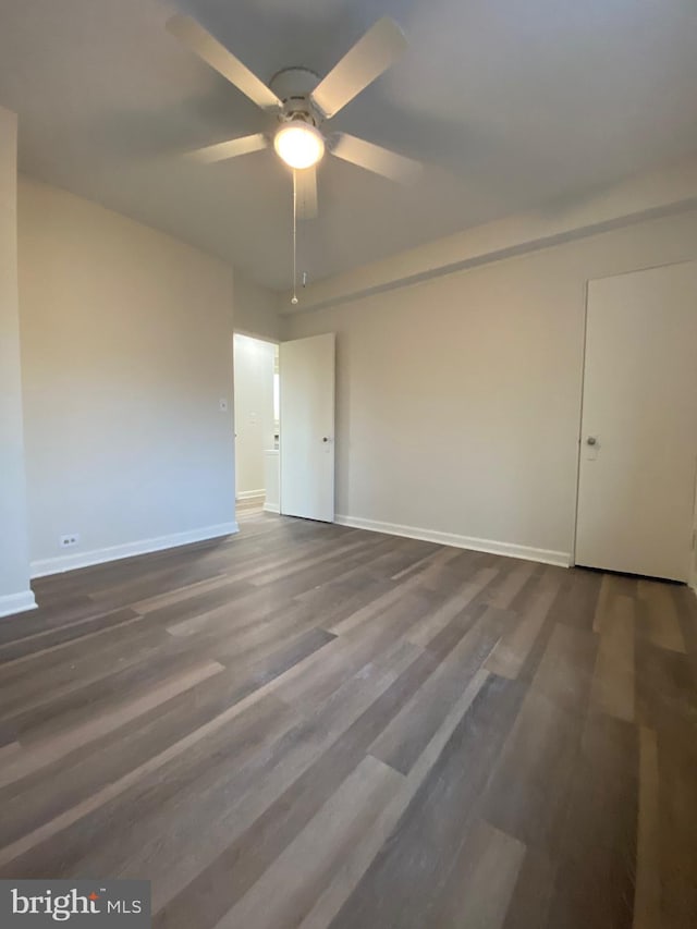 unfurnished room with ceiling fan and hardwood / wood-style floors