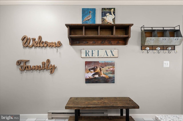 interior space with baseboards and a baseboard heating unit