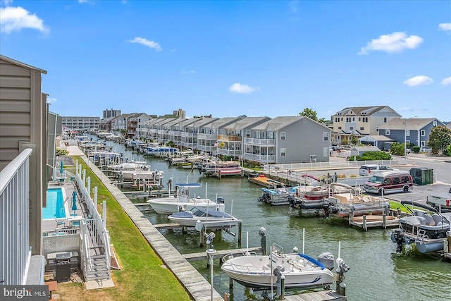 view of dock featuring a pool and a water view