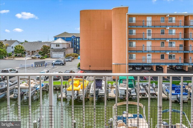 balcony featuring a water view