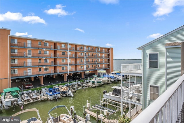 property view of water featuring a boat dock