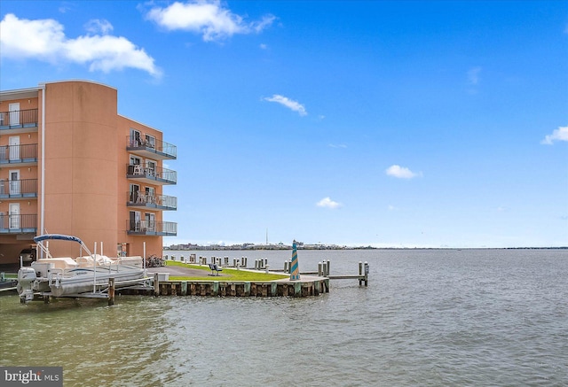 dock area with a water view