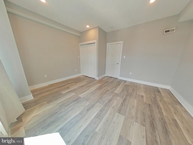 empty room featuring light hardwood / wood-style flooring