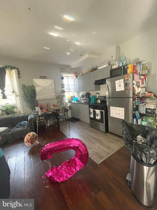 dining room with hardwood / wood-style floors