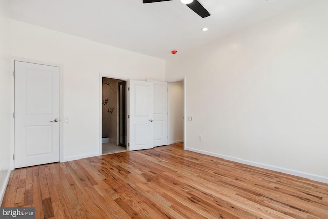 unfurnished bedroom featuring light wood-type flooring and ceiling fan