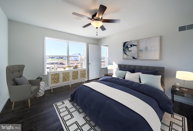 bedroom featuring ceiling fan and dark hardwood / wood-style floors