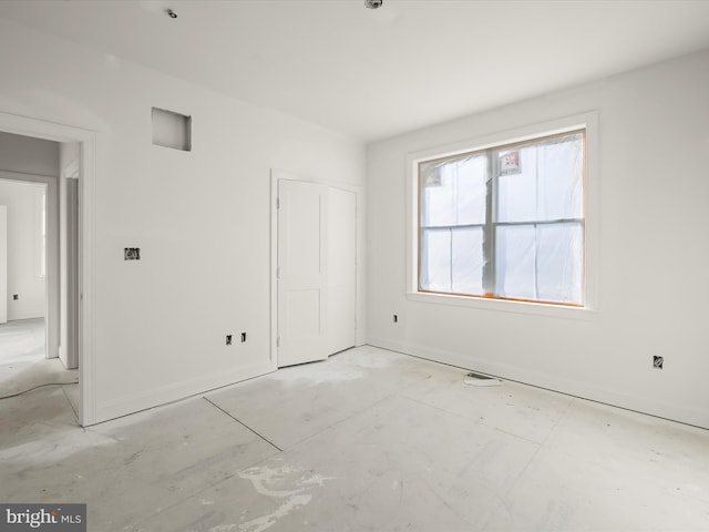 unfurnished room with plenty of natural light