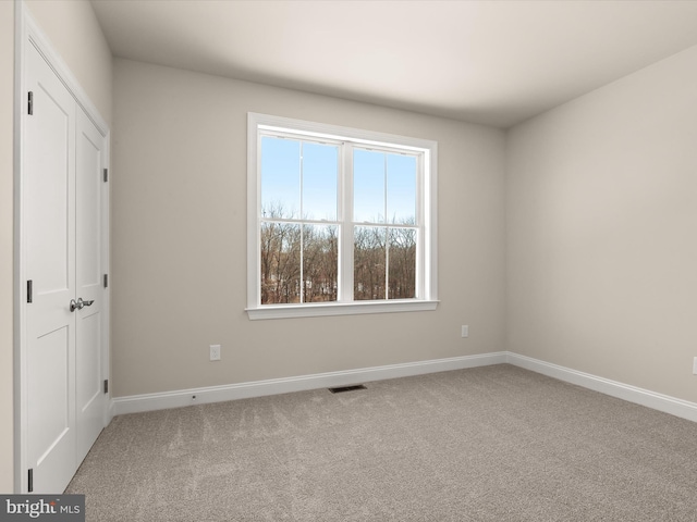 473 Orange Tree Ln, Westminster, MD 21157 - unfurnished bedroom with carpet floors, baseboards, and a closet