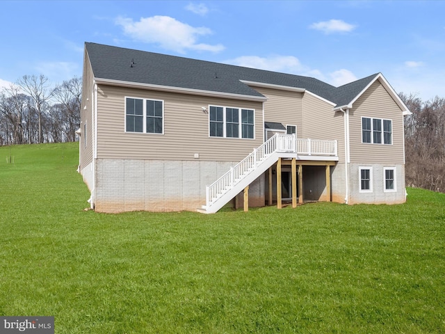 473 Orange Tree Ln, Westminster, MD 21157 - rear view of house featuring a wooden deck, stairs, a lawn, brick siding, and a shingled roof