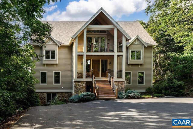 view of front of home with a balcony