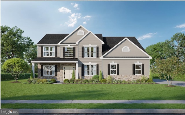 view of front of property with stone siding and a front lawn