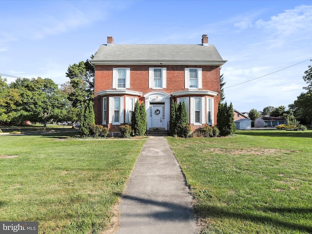 view of front facade with a front yard