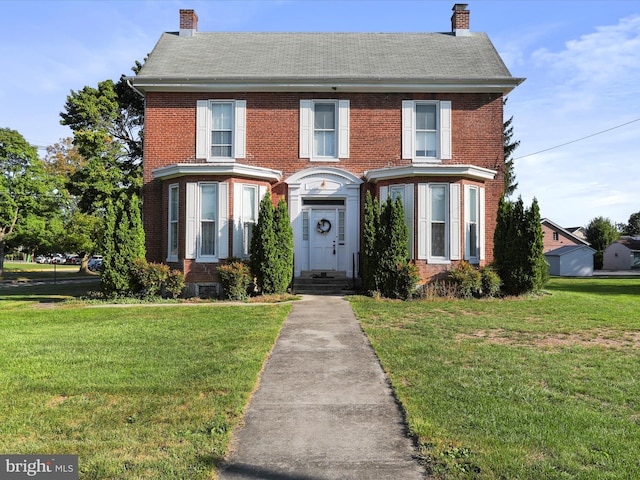 view of front of property with a front lawn