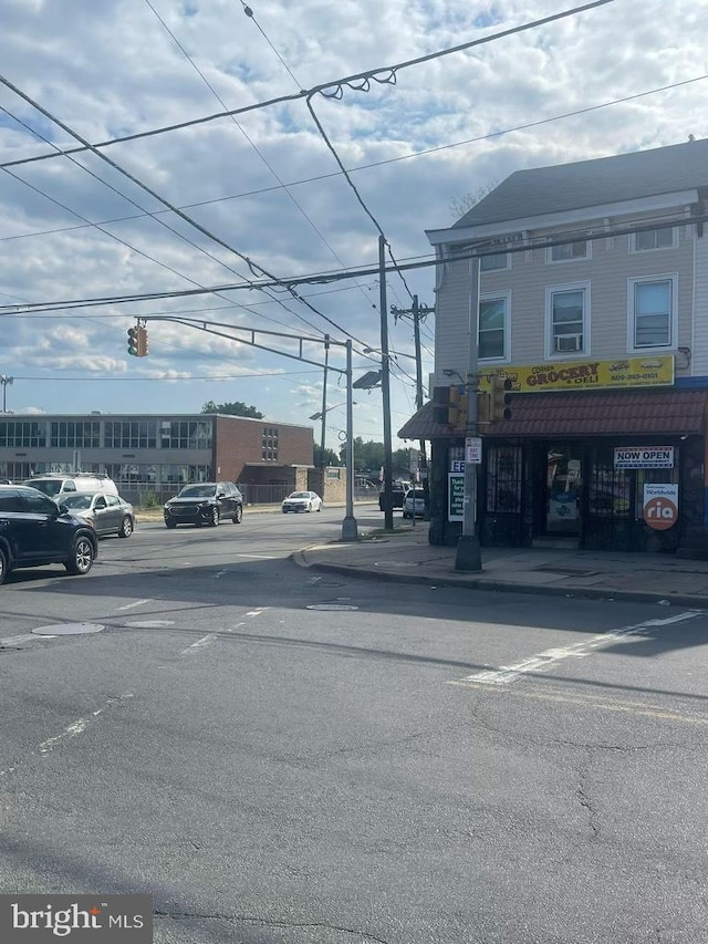 view of road featuring curbs and sidewalks