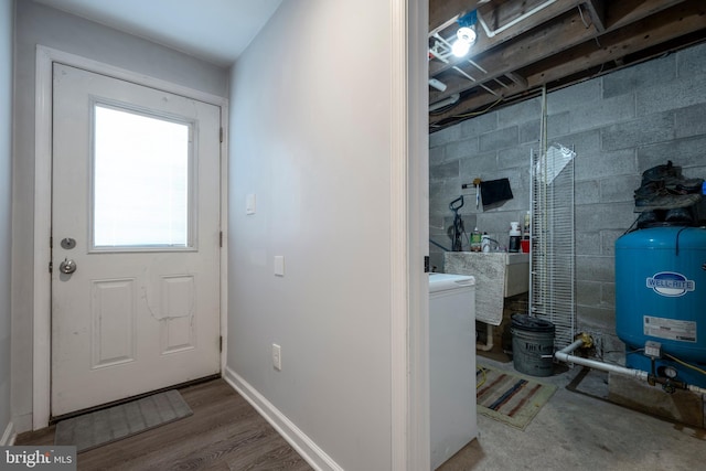 interior space featuring washer / dryer and hardwood / wood-style flooring