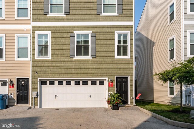 view of property featuring a garage