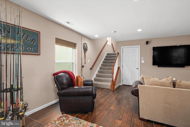 living area with recessed lighting, dark wood-style flooring, stairway, and baseboards