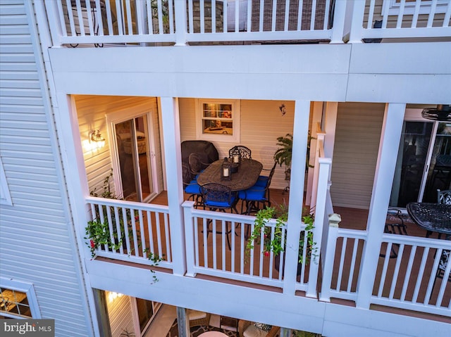 exterior space with a balcony and covered porch