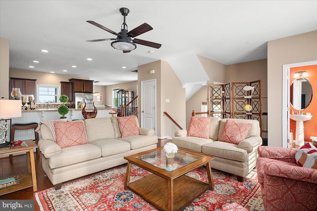 living area featuring recessed lighting and ceiling fan