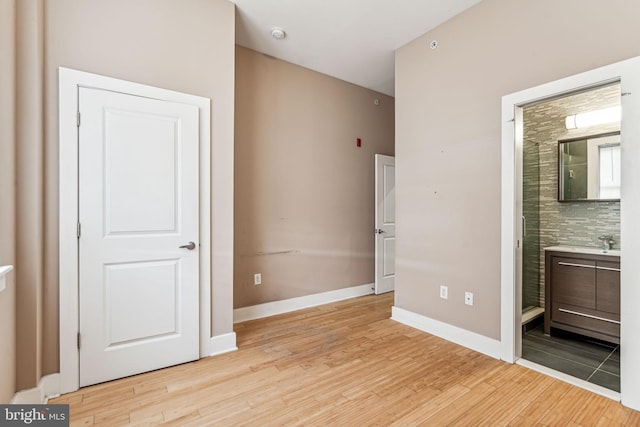 unfurnished bedroom with light hardwood / wood-style floors