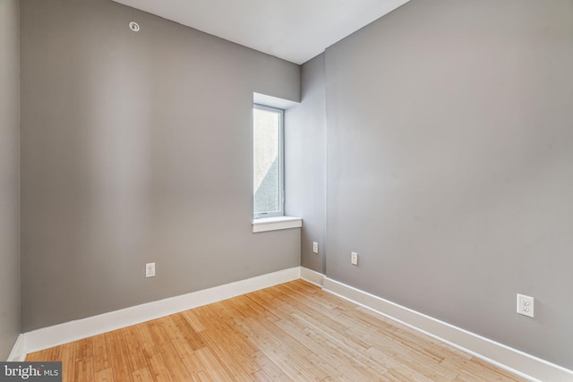 empty room with light wood-type flooring