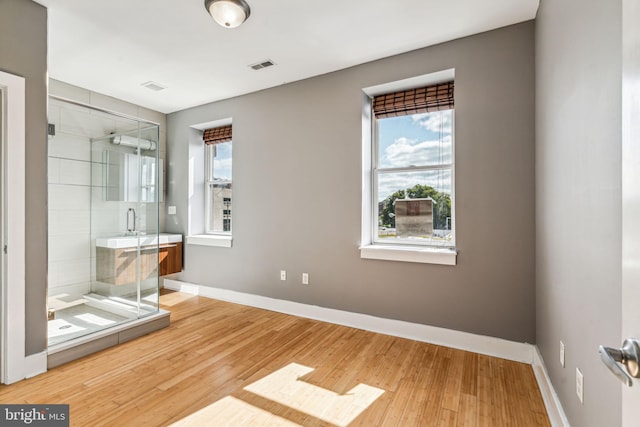 unfurnished bedroom featuring light hardwood / wood-style flooring