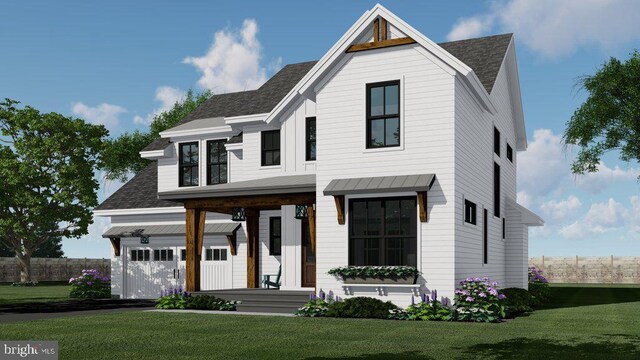 view of front facade featuring a garage and a front lawn